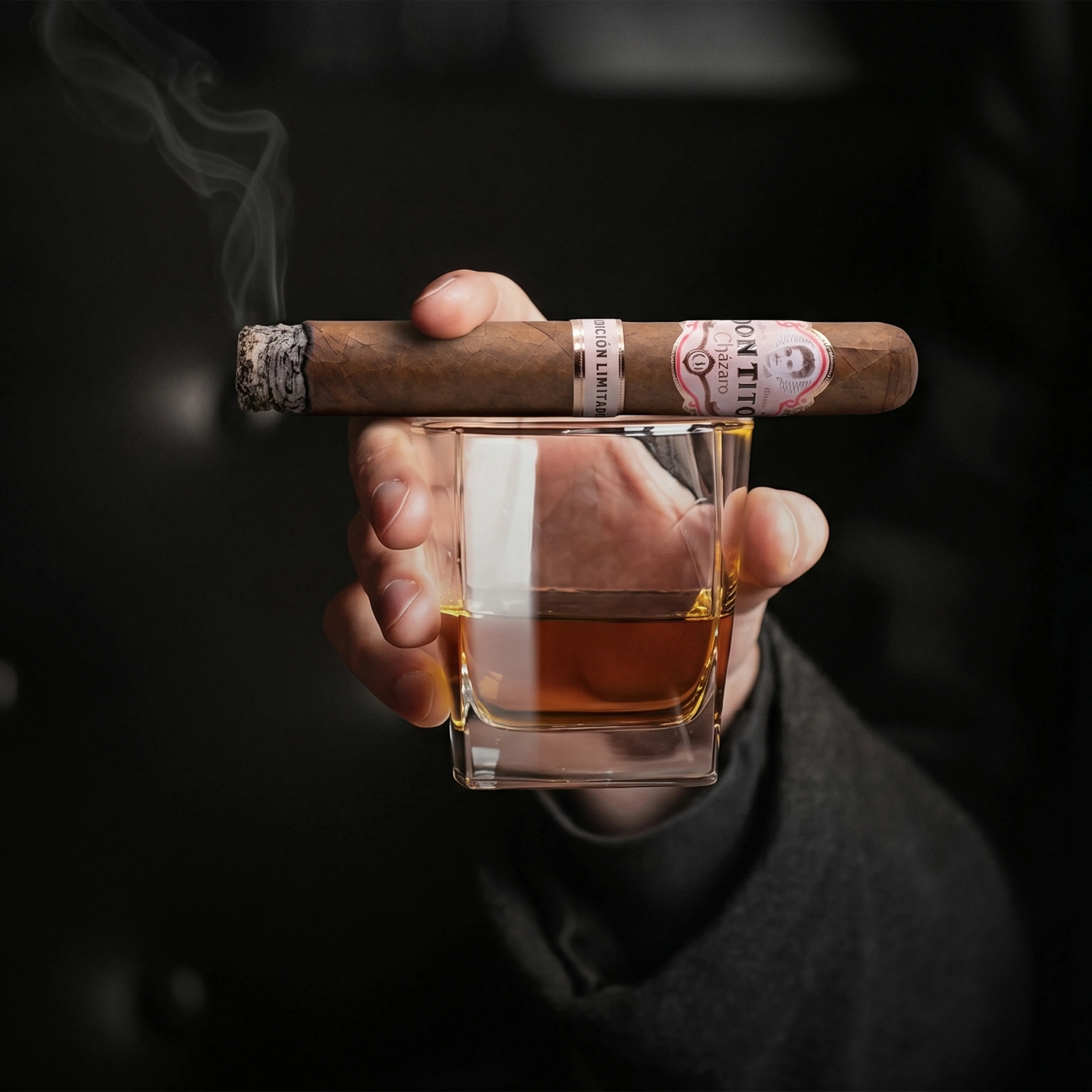Don Tito cigar presented over a glass